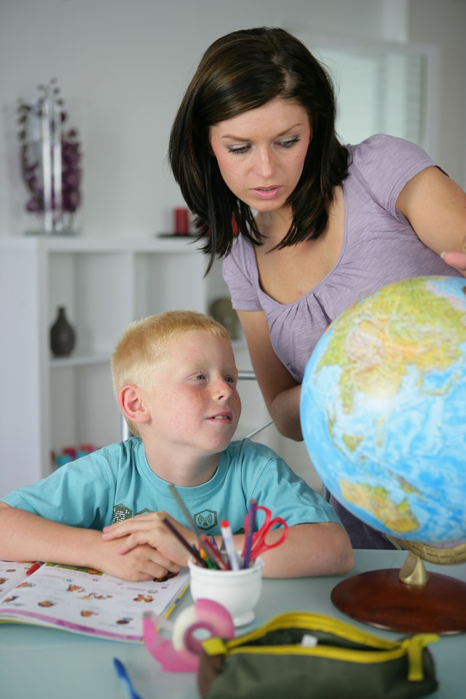 Mom and son homeschool geography lesson